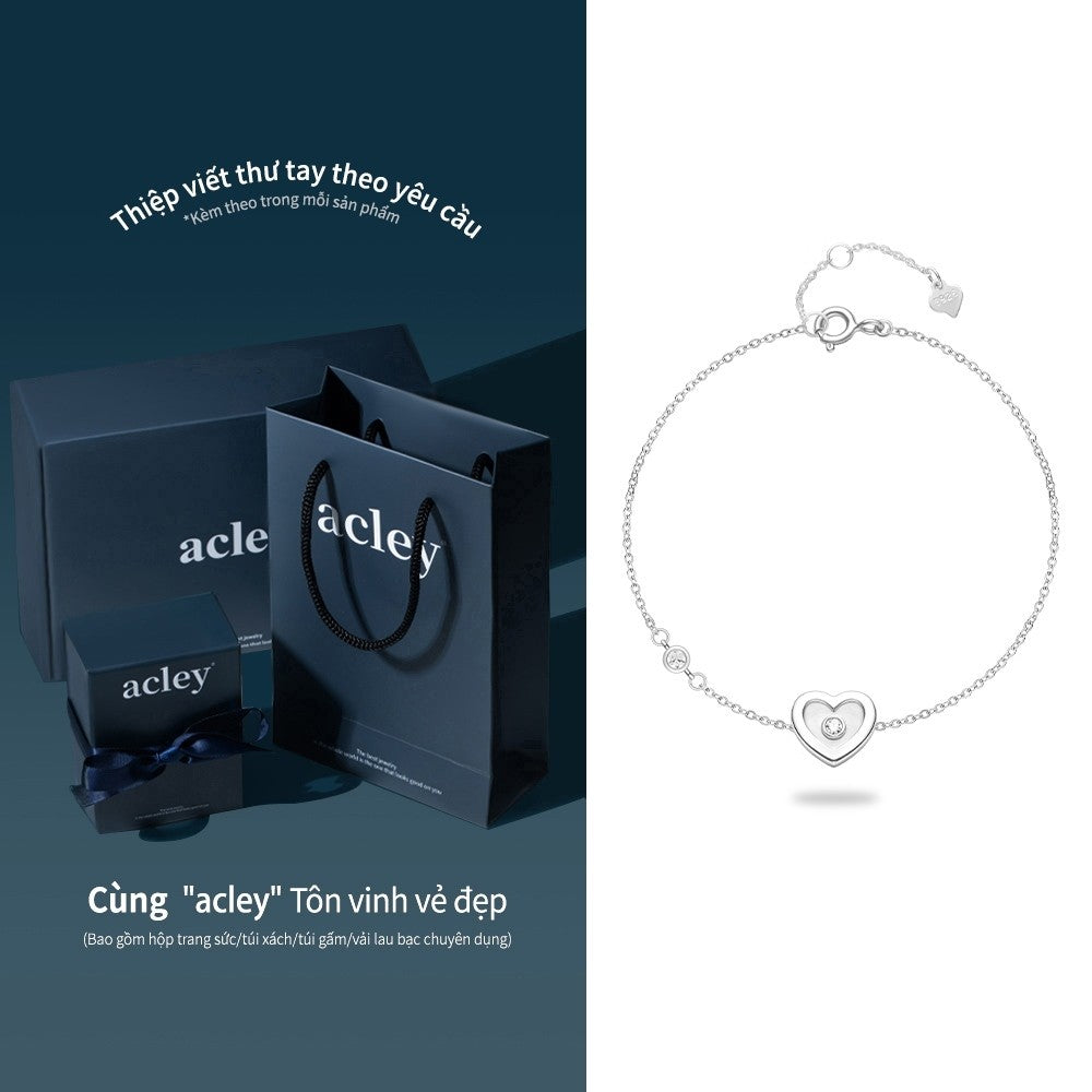 Lắc tay bạc S925 hình trái tim xà cừ trắng đính đá zircon 5A
