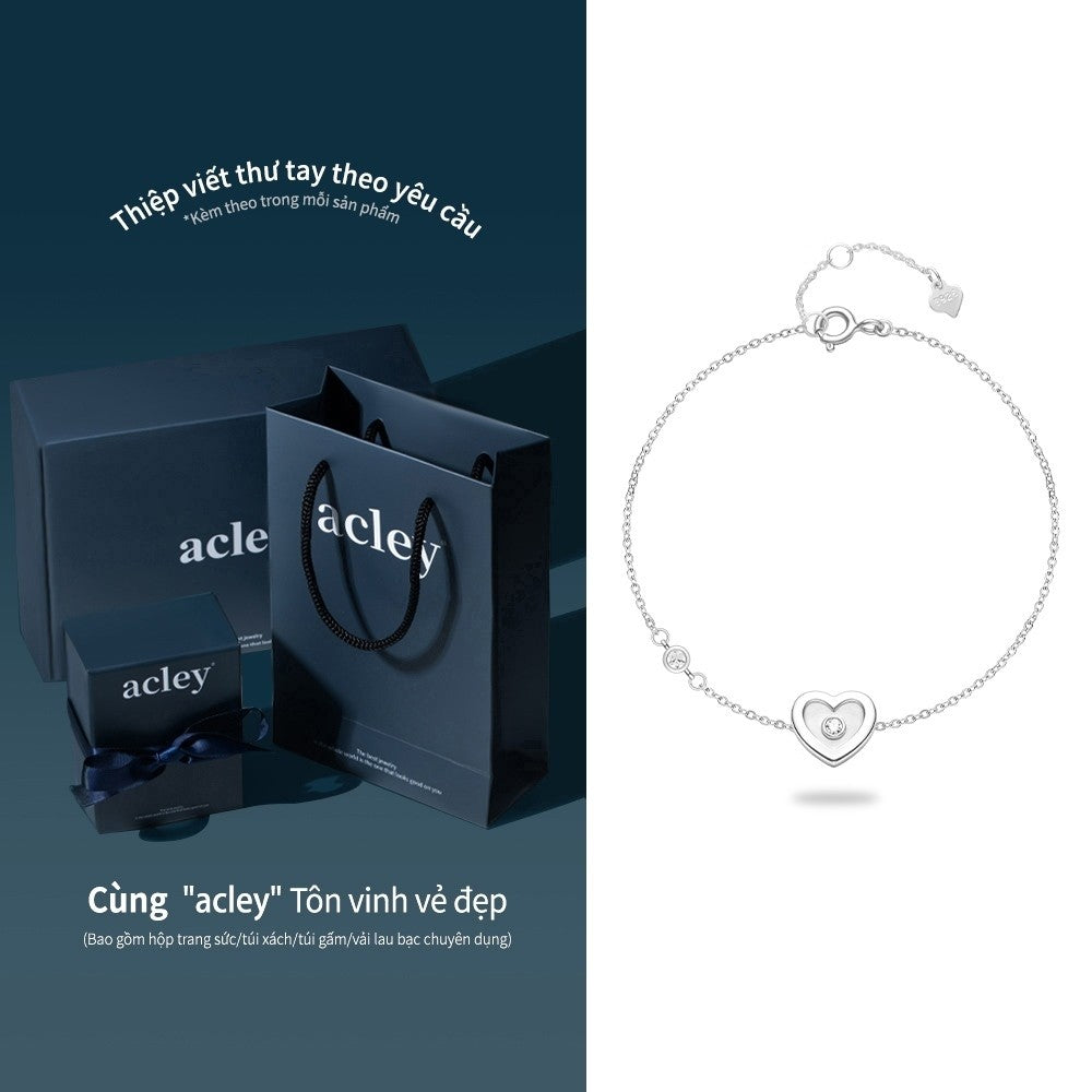 Lắc tay bạc S925 hình trái tim xà cừ trắng đính đá zircon 5A