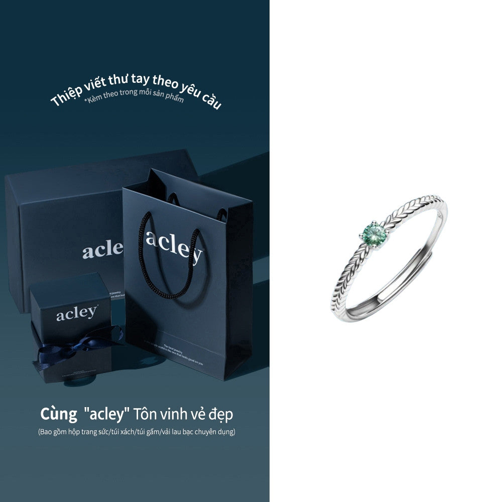 Nhẫn bạc S925 đính đá Moissanite xanh dáng xoắn