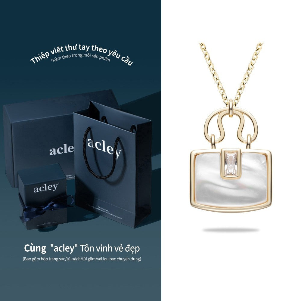 Dây chuyền bạc S925 mặt túi xách xà cừ trắng đính đá zircon 5A