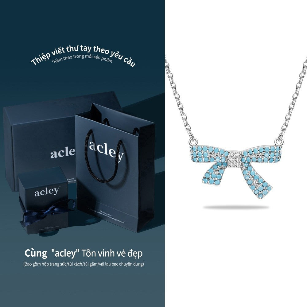 Dây chuyền nơ bạc S925 khảm đá turquoise