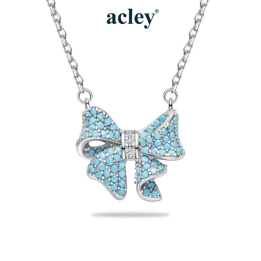 Dây chuyền nơ bạc S925 khảm đá turquoise
