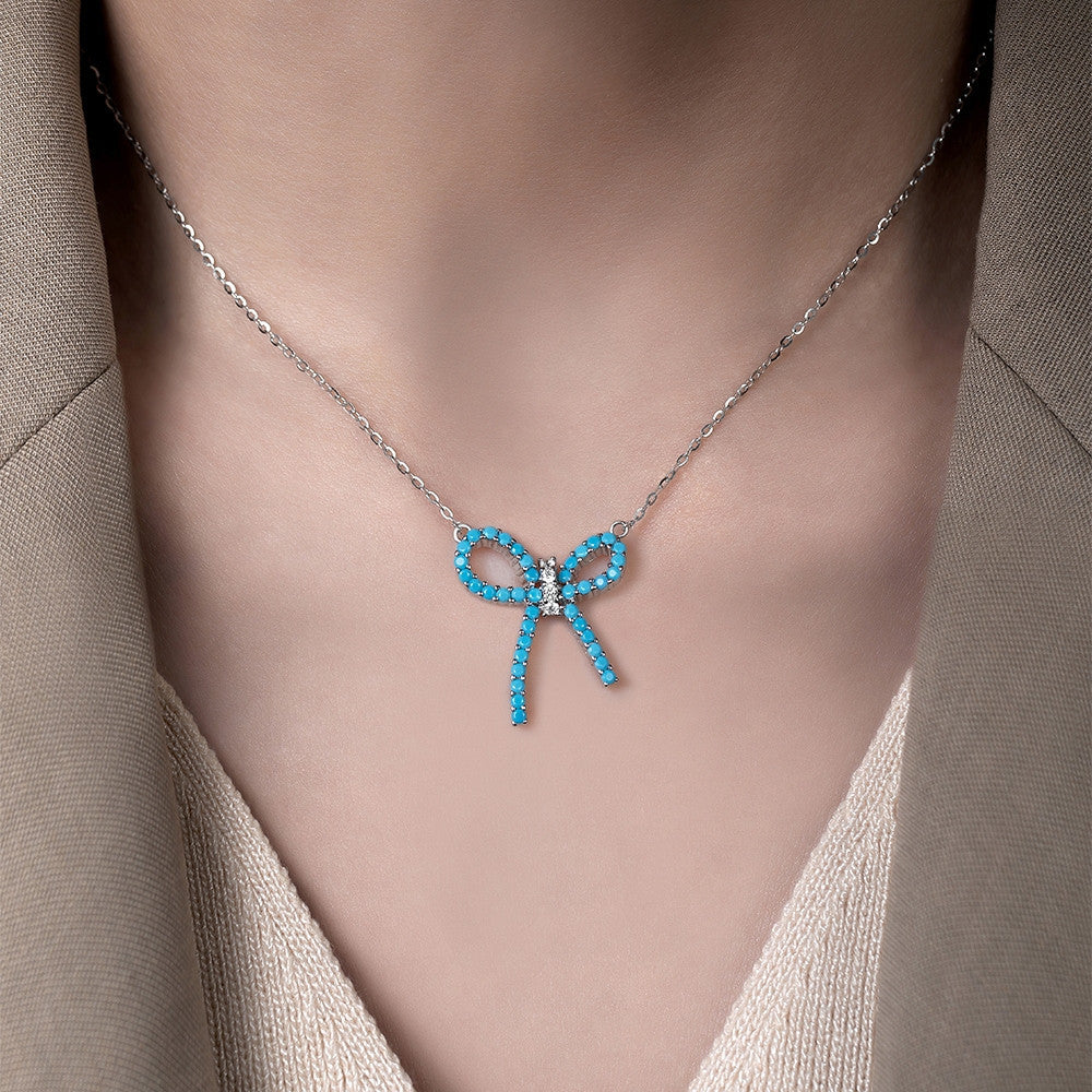 Dây chuyền nơ bạc S925 khảm đá turquoise