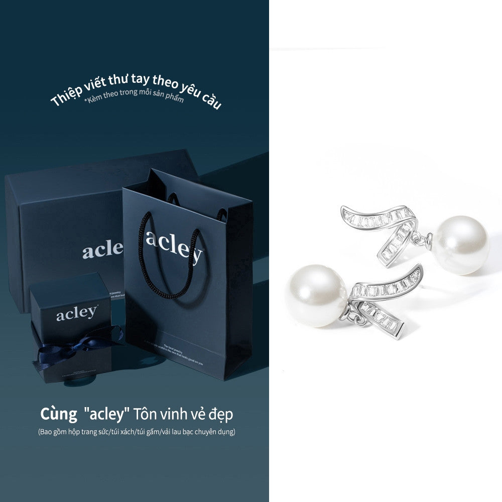 Bông tai bạc S925 ngọc trai đính đá zircon 5A dáng lá cong