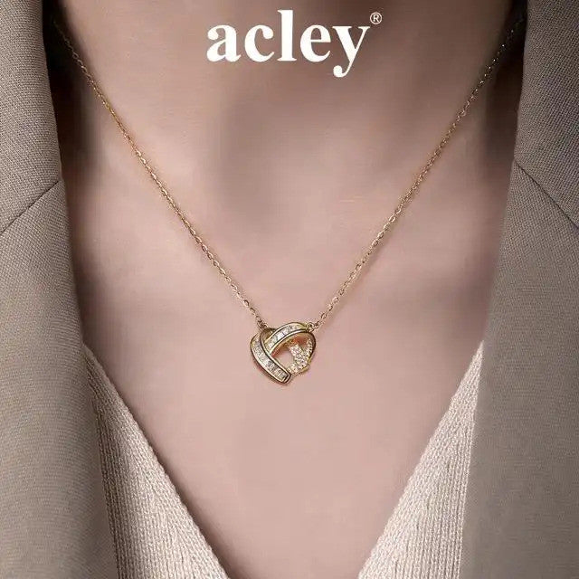 Dây chuyền bạc S925 mặt trái tim cách điệu đính đá zircon 5A