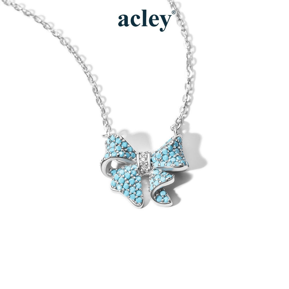 Dây chuyền nơ bạc S925 khảm đá turquoise