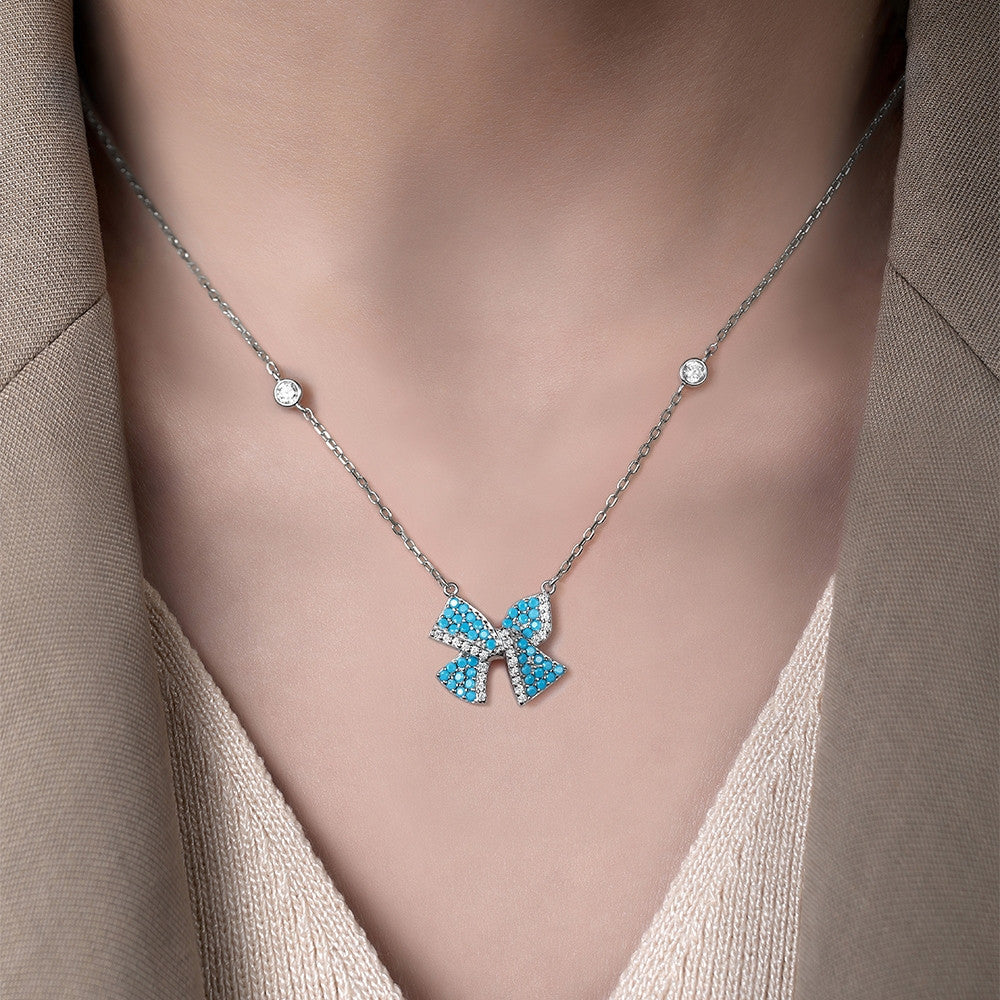 Dây chuyền nơ bạc S925 khảm đá turquoise