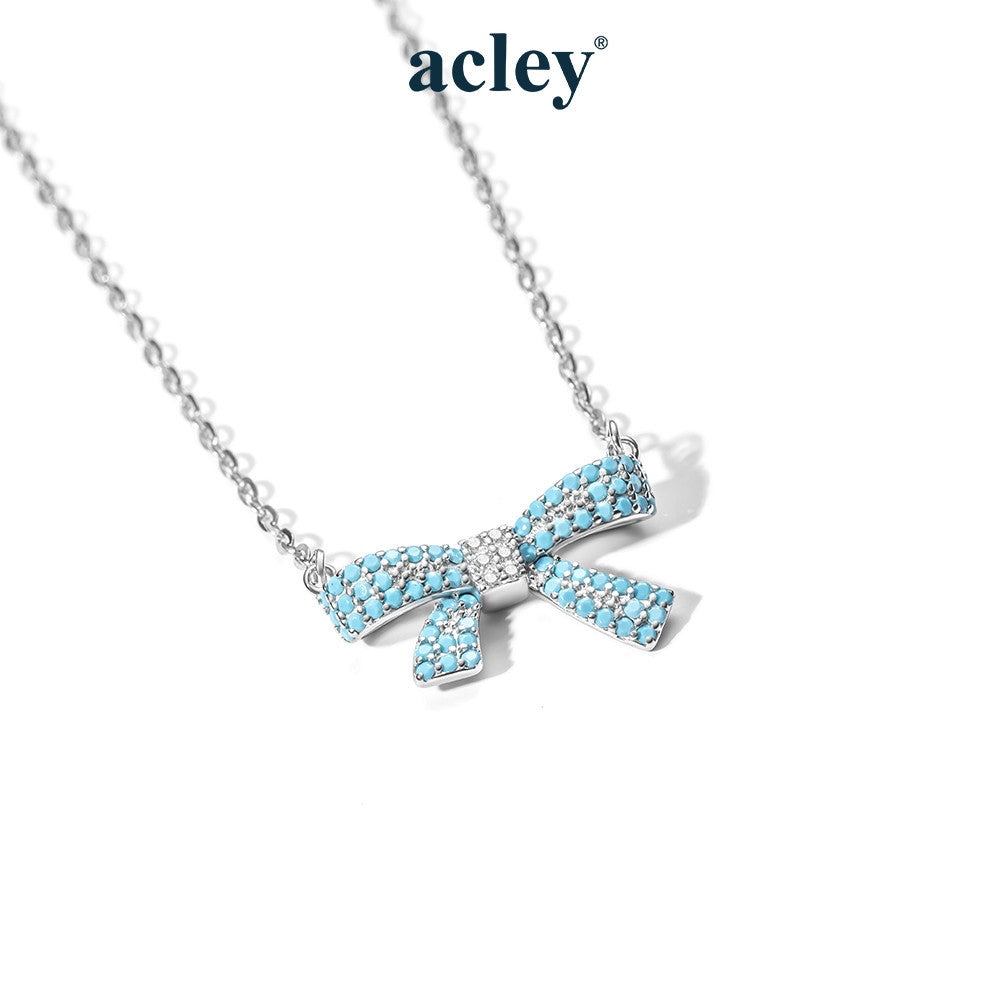 Dây chuyền nơ bạc S925 khảm đá turquoise