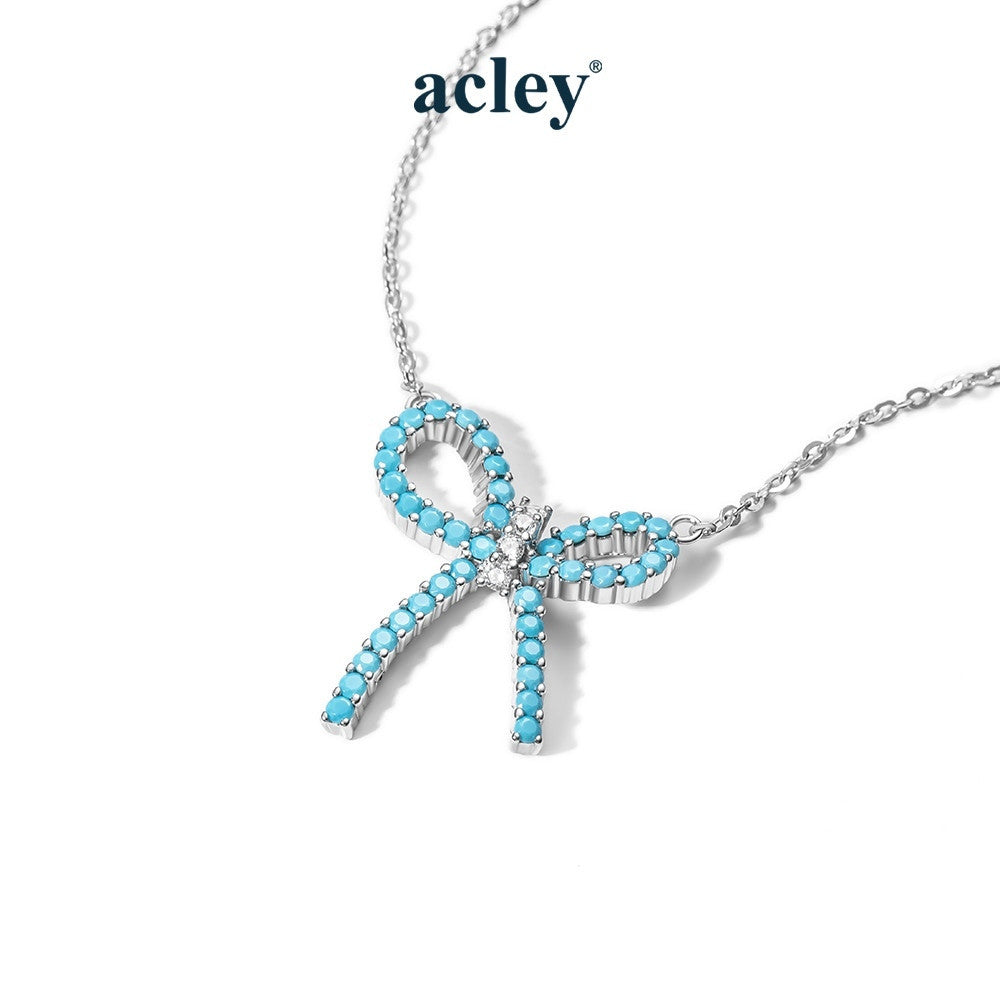 Dây chuyền nơ bạc S925 khảm đá turquoise