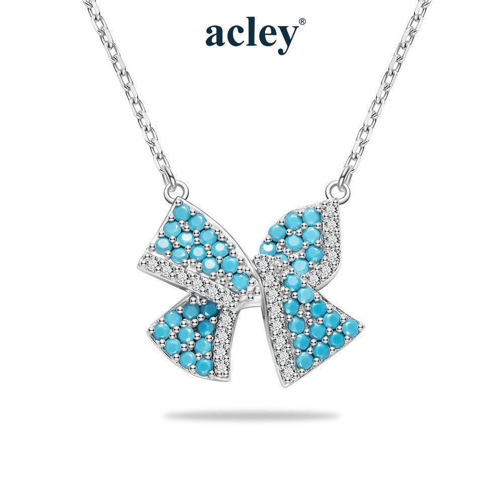 Dây chuyền nơ bạc S925 khảm đá turquoise
