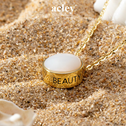 Dây chuyền bạc S925 mặt tròn xà cừ trắng chữ BEAUTY