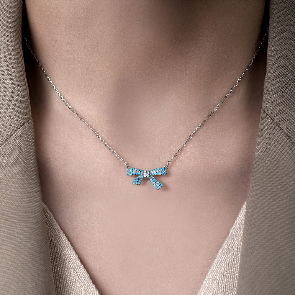 Dây chuyền nơ bạc S925 khảm đá turquoise